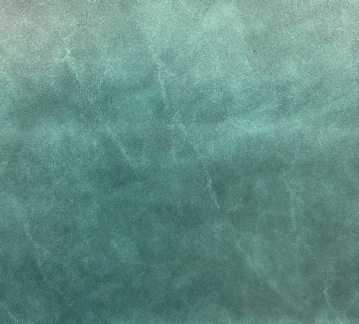 A textured green upholstery fabric